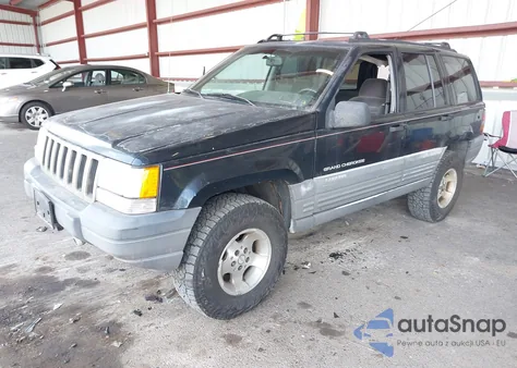 1997 Jeep Grand Cherokee Laredo/Tsi из США, поврежденный, VIN 1J4GZ58SXVC672056